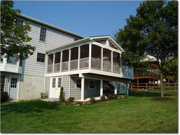 Finished custom deck with outdoor furniture in Severn MD