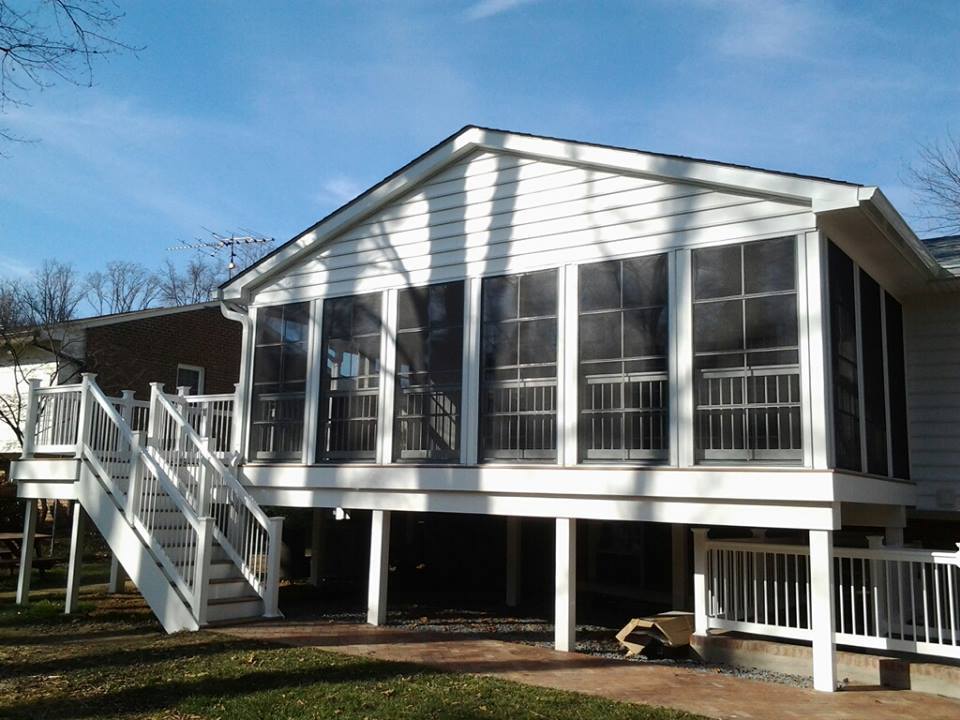 Elevated deck with stairs and integrated lighting in Glencoe