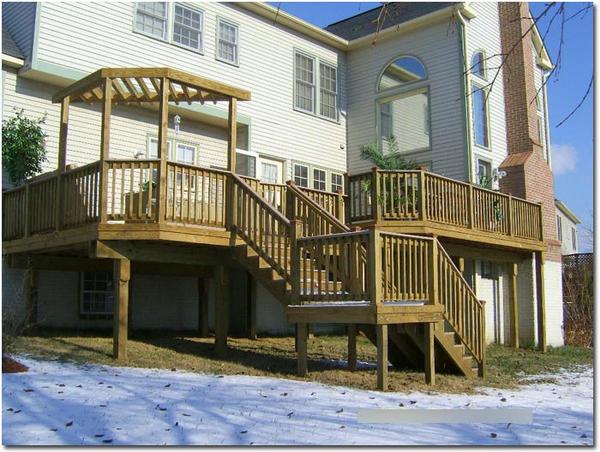 Beautiful wooden deck with custom railing in Glencoe, MD